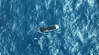 Illustration photo: a boat carrying a group of stranded migrants in the southern Mediterranean Sea