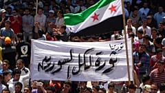 صورة من عام 2012 أثناء مظاهرة مناوئة لنظام السوري في إدلب 