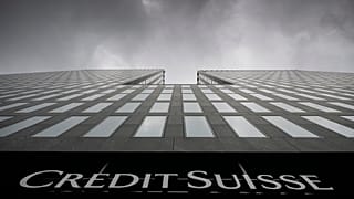 Grey clouds cover the sky over a building of the Credit Suisse bank in Zurich, Switzerland.