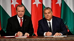 FILE: Turkish President Recep Tayyip Erdogan, left, and Hungarian Prime Minister Viktor Orban sign a document during their meeting in Budapest, Hungary, Thursday, Nov. 7, 2019