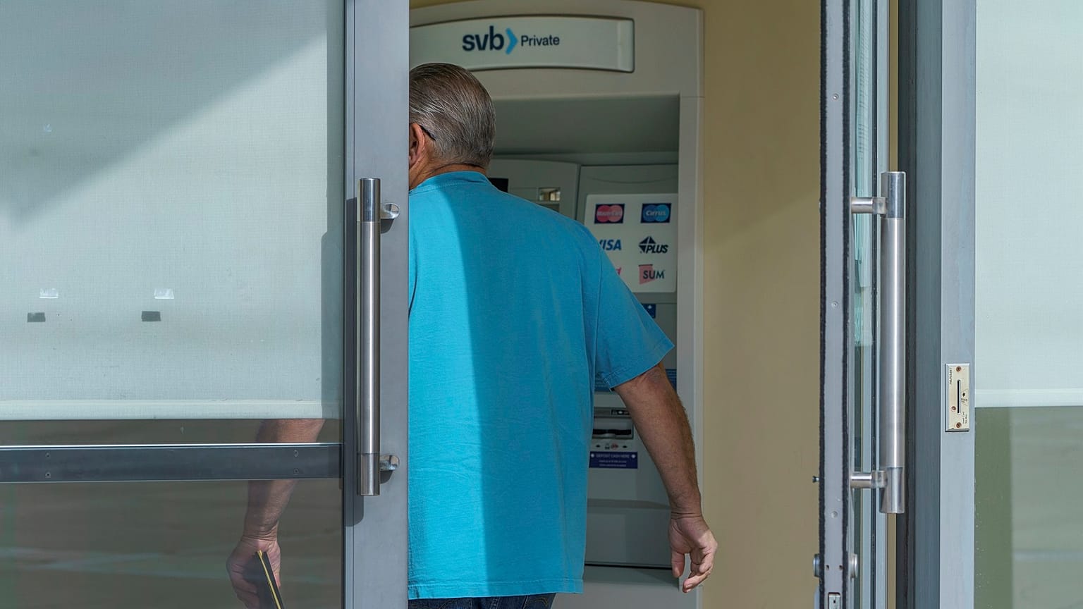 A customer enters the Silicon Valley Bank Private branch in Pasadena, California, on Monday, March 13, 2023.