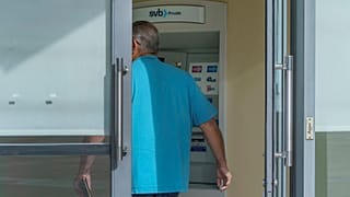A customer enters the Silicon Valley Bank Private branch in Pasadena, California, on Monday, March 13, 2023.