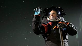 Axiom Space chief engineer Jim Stein demonstrates a prototype spacesuit, Wednesday, March 15, 2023, in Houston. 