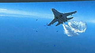 Russian Su-27 approaching the back of the MQ-9 drone