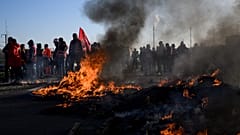 Burning detritus after pension reform protests in Paris