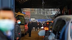 WHO team enters the interior of the Huanan Seafood Market on the third day of field visit in Wuhan in central China., Jan. 31, 2021