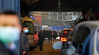 WHO team enters the interior of the Huanan Seafood Market on the third day of field visit in Wuhan in central China., Jan. 31, 2021