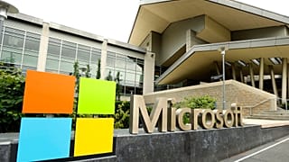  In this July 3, 2014, file photo, the Microsoft Corp. logo is displayed outside the Microsoft Visitor Center in Redmond, Wash