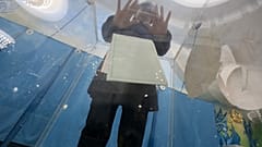 A woman votes during parliamentary elections in Almaty on March 19, 2023.