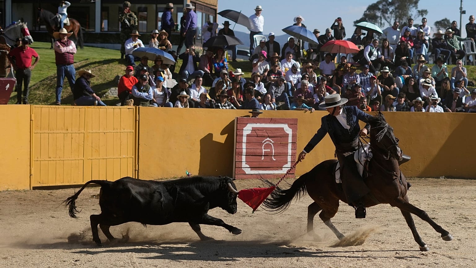 Mounted bullfighter Juan Rafael Restrepo performs during a bullfight at the Hacienda Vista Hermosa bullring in Villa Pinzón, Colombia, 25 February 2023.