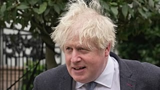 Former British Prime Minister Boris Johnson leaves his home, in London, Tuesday, March 21, 2023. (AP Photo/Kin Cheung)