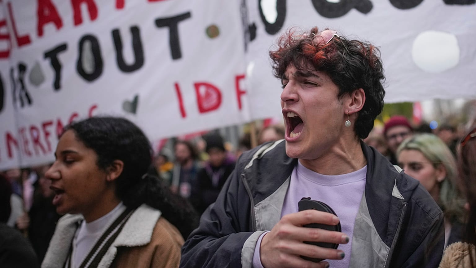 Protesters rally in Paris against President Emmanuel Macron's pension reform