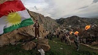 Iraqi Kurds celebrate their Nowruz New Year festival in Akre, the country's autonomous Kurdish region, March 20, 2023.