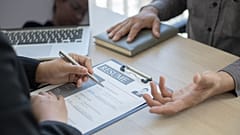 A recruiter and an interviewee during a recruitment process.