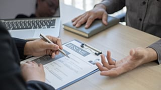 A recruiter and an interviewee during a recruitment process.