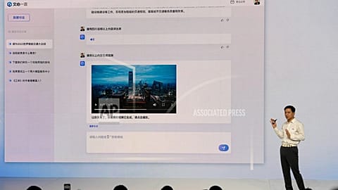 Baidu CEO Robin Li introduces the functions of Ernie Bot during an event in Beijing