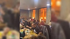 Diners continued eating their meals seemingly unfazed