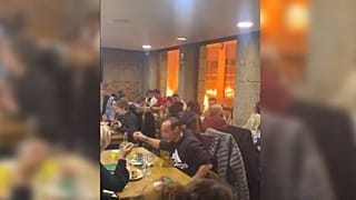 Diners continued eating their meals seemingly unfazed