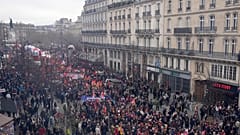 People march during a demonstration Tuesday, March 28, 2023 in Paris. Protests are taking place in France on Tuesday.
