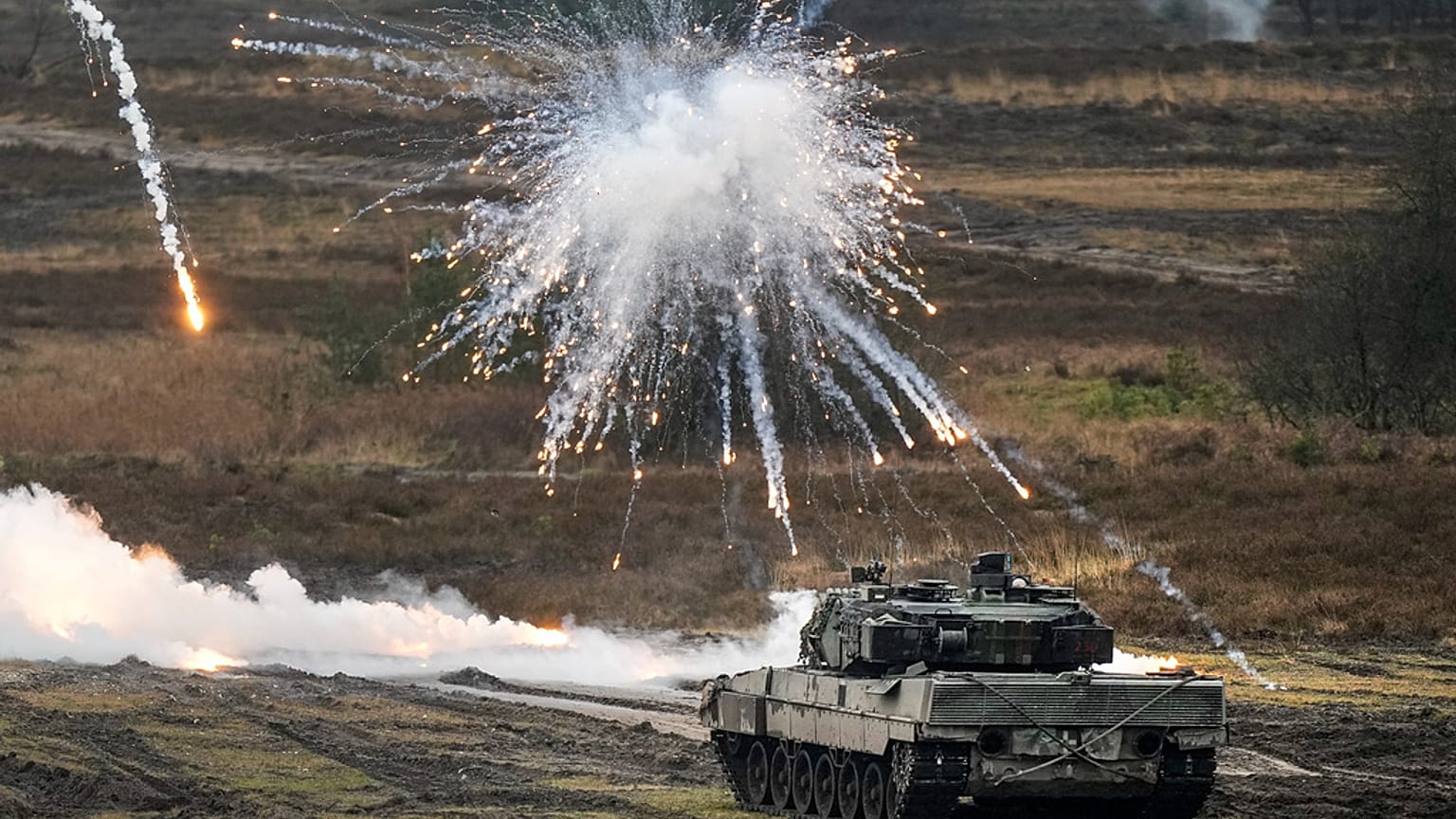 A Leopard 2 tank is seen in action at the Field Marshal Rommel Barracks in Augustdorf, Germany, Wednesday, Feb. 1, 2023. 