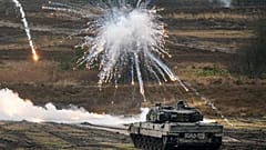 A Leopard 2 tank is seen in action at the Field Marshal Rommel Barracks in Augustdorf, Germany, Wednesday, Feb. 1, 2023. 