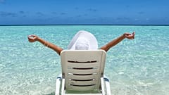 Someone relaxing on a beach. 