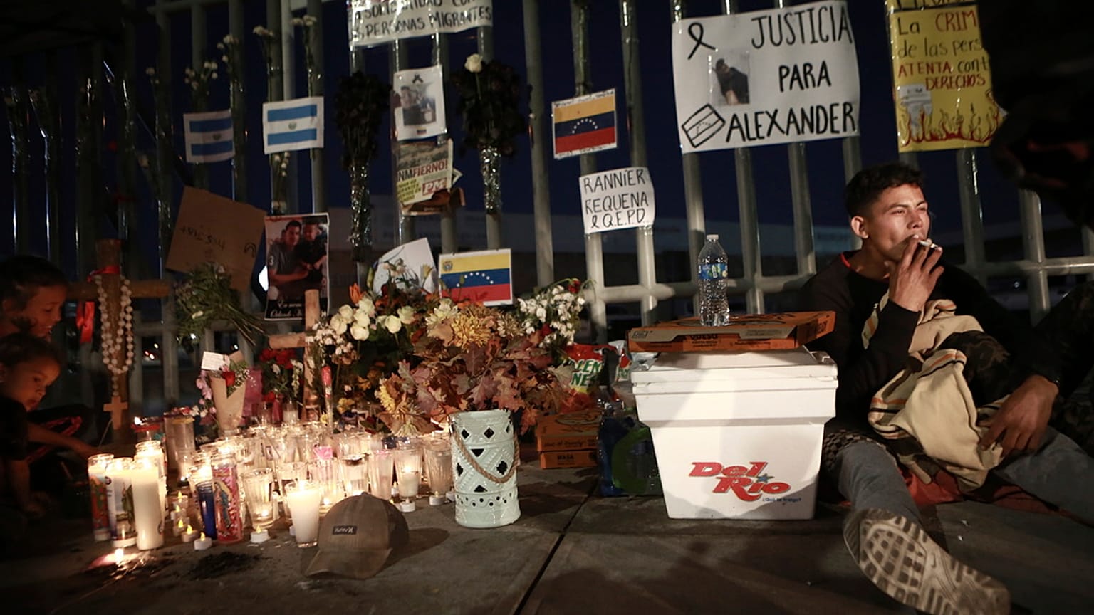 Activists and migrants join a vigil for the victims of a fire at a migration detention center in Ciudad Juarez, Mexico, March 29, 2023
