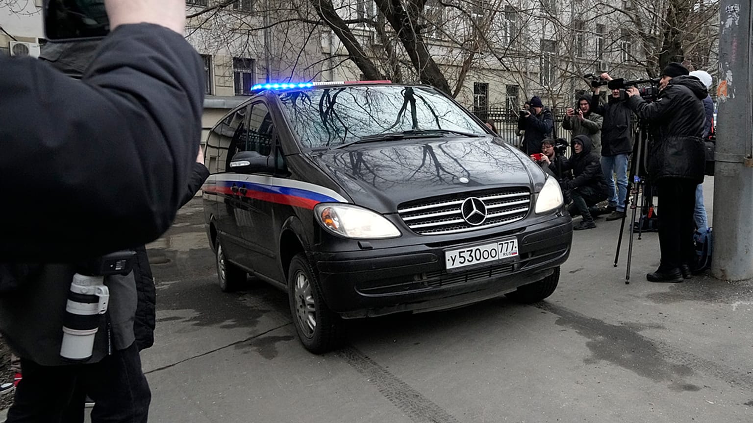 A van carrying Wall Street Journal reporter Evan Gershkovich leaves the Lefortovsky court, in Moscow, Russia, Thursday, March 30, 2023.