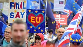 FILE: Demonstrators protest against Brexit as the governing Conservative Party start their annual four-day party conference in Birmingham, England, Sunday Sept 30, 2018. 
