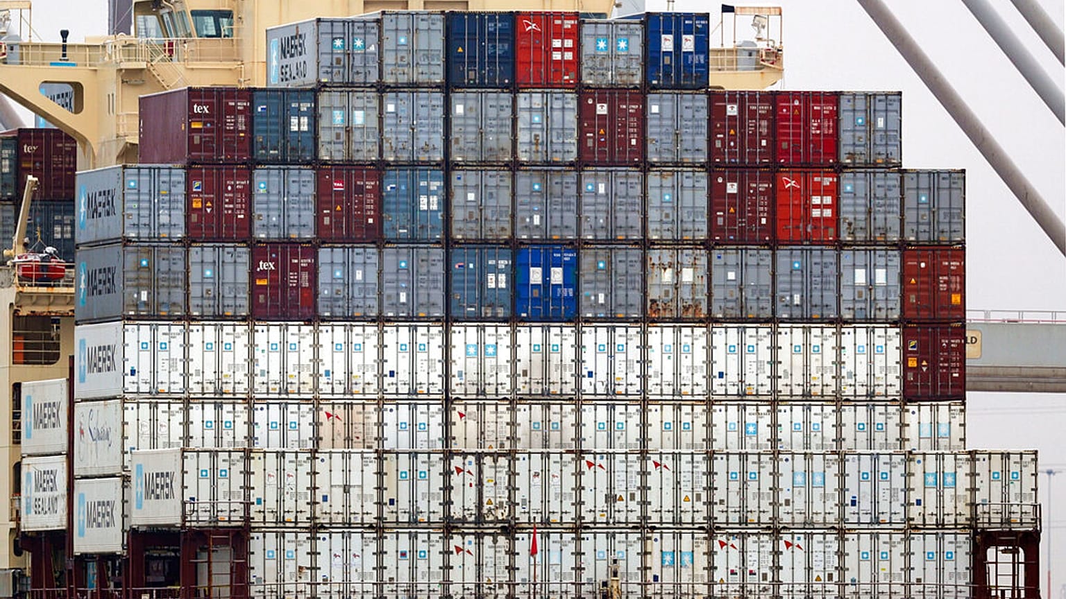 FILE - Shipping containers aboard a cargo ship at port of Southampton, southern England, Jan. 1, 2021. 