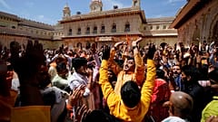Devotees sing and dance to celebrate Ramnavmi festival, celebrated as the birthday of Hindu god Rama, in Ayodhya, India, March 30, 2023
