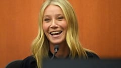 Gwyneth Paltrow laughs on the stand during her televised trial 