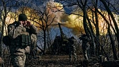 krainian soldiers fire a self-propelled howitzer towards Russian positions near Bakhmut, Donetsk region. 