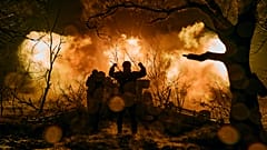 FILE - Ukrainian soldiers fire artillery at Russian positions near Bakhmut, in the Donetsk region of Ukraine, on Nov. 20, 2022.