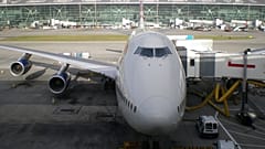 The UK has halved its air passenger duty on domestic flights.