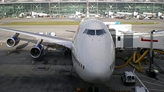 The UK has halved its air passenger duty on domestic flights.