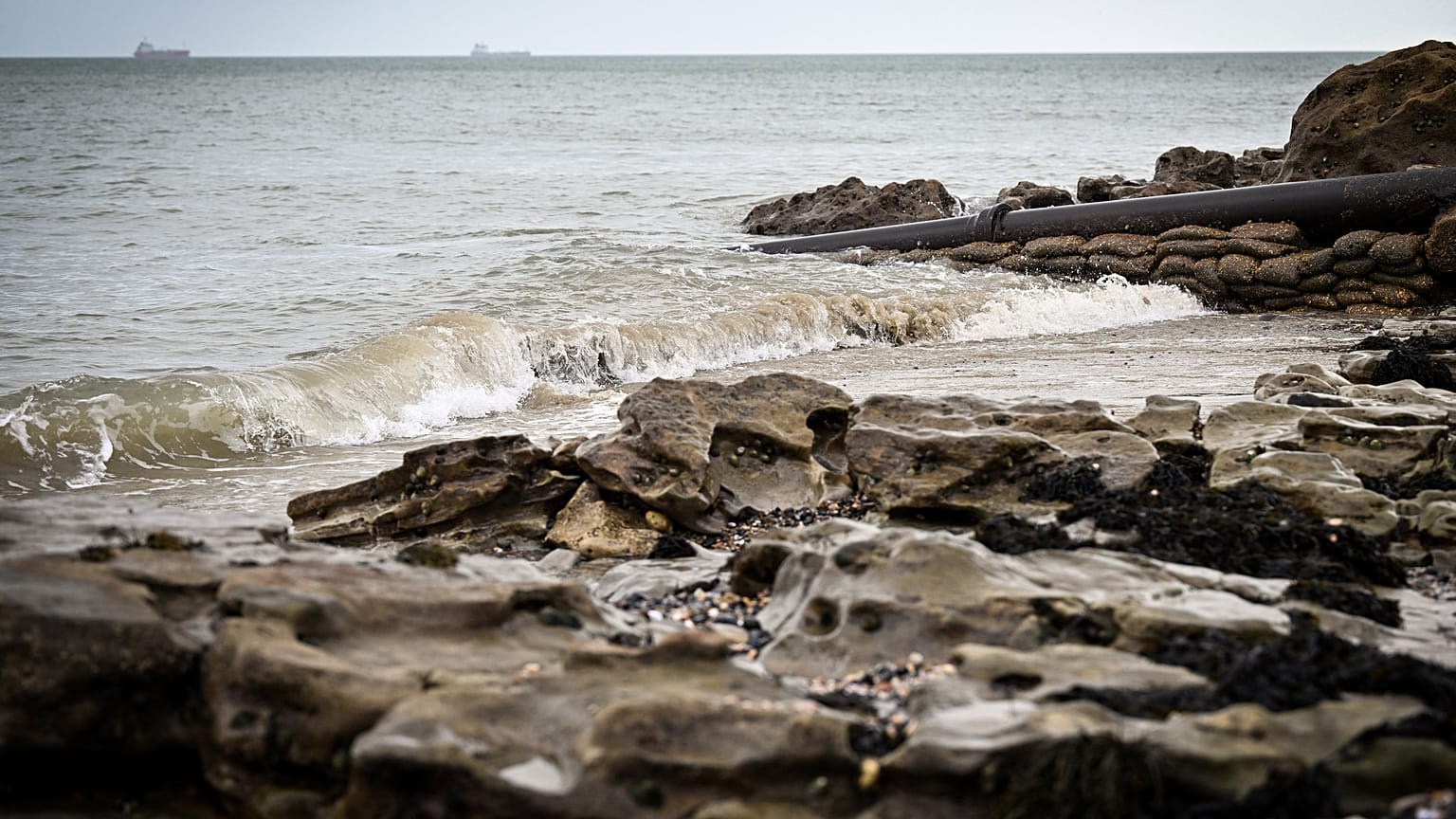 A photograph taken on March 30, 2023 shows a Combined Sewer Overflow pipe on Ryde beach on the Isle of Wight which has suffered from sewage pollution in recent years.