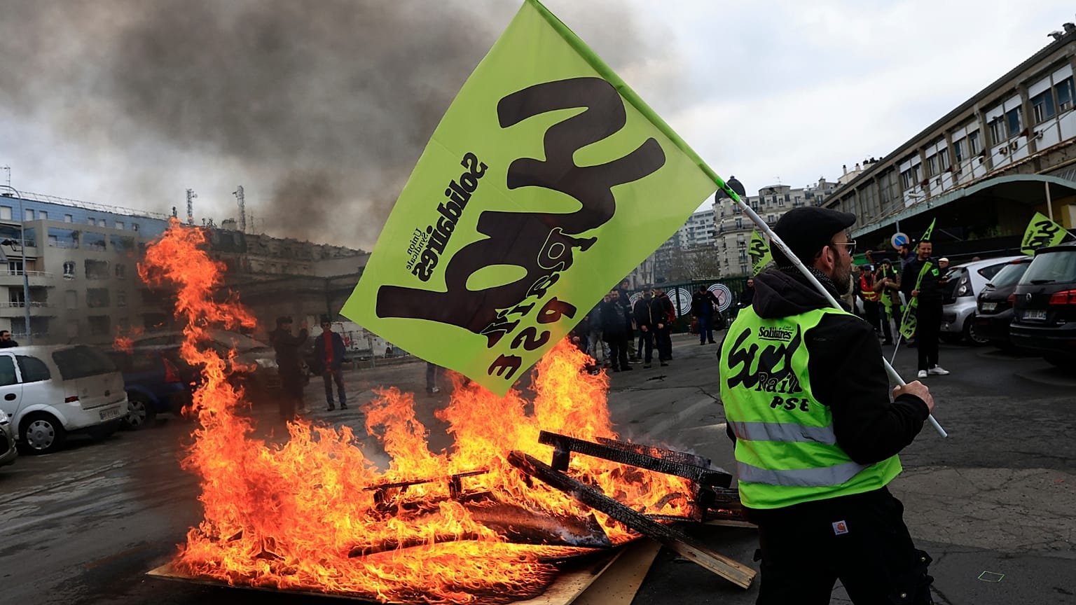 Railway workers gather at the Gare de Lyon train station, Thursday, April 6, 2023 in Paris. 