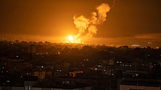 Fire and smoke rise following an Israeli airstrike in central Gaza Strip, Friday, April 7, 2023. 