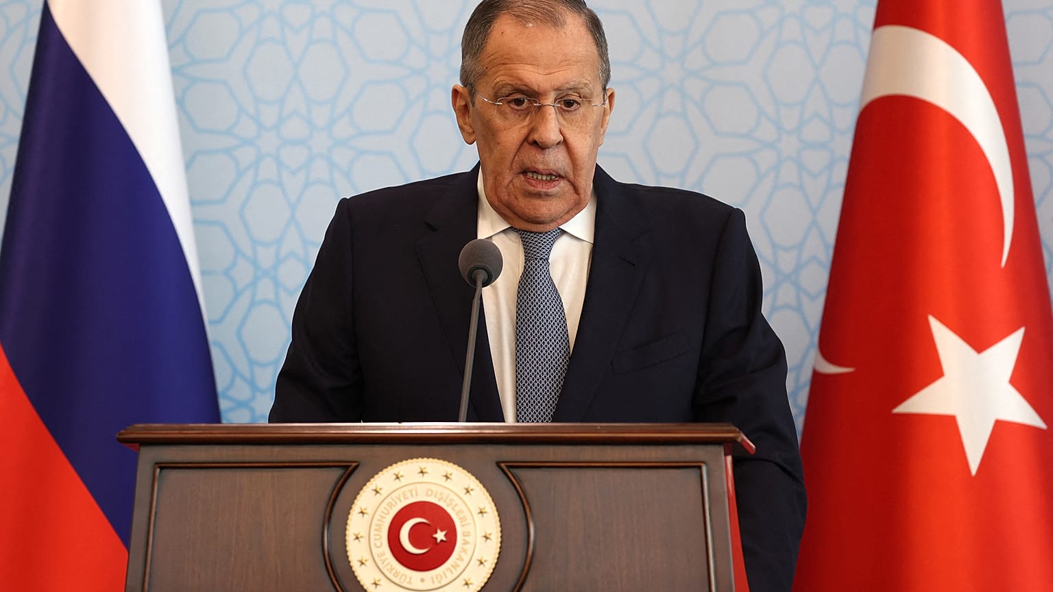 Russian Foreign Minister Sergey Lavrov speaks as the Turkish Foreign Minister listens on during a joint press conference following talks in Ankara on April 7, 2023