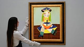 The painting " Maya" by Spanish painter Pablo Picasso in 1938, is on display during a media preview of Sotheby's auction, in London.