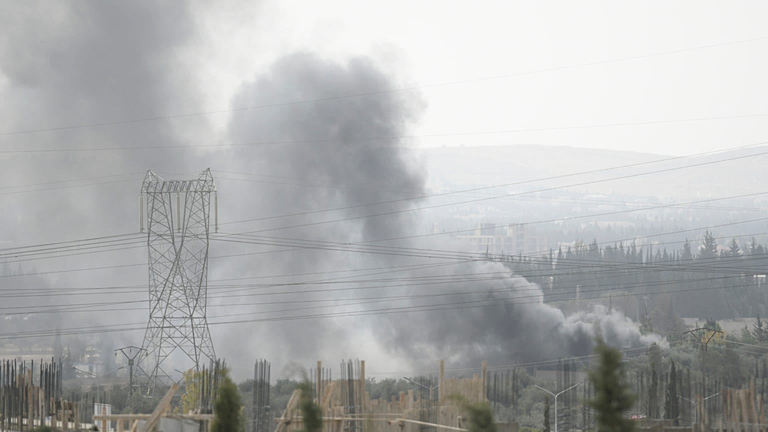 Smoke rises in the countryside of Damascus, Syria, on Saturday Oct 30, 2021, following what Syrian state media said was an Israeli airstrike.