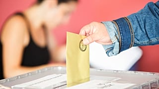 A man casts his ballot at a polling station in Istanbul during the mayoral election on June 23, 2019