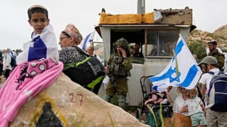 Israeli stand in outpost of Eviatar in the West Bank, Monday, 10 April. 
