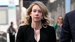 Former Theranos CEO Elizabeth Holmes leaves federal court in San Jose, California, March 17, 2023.