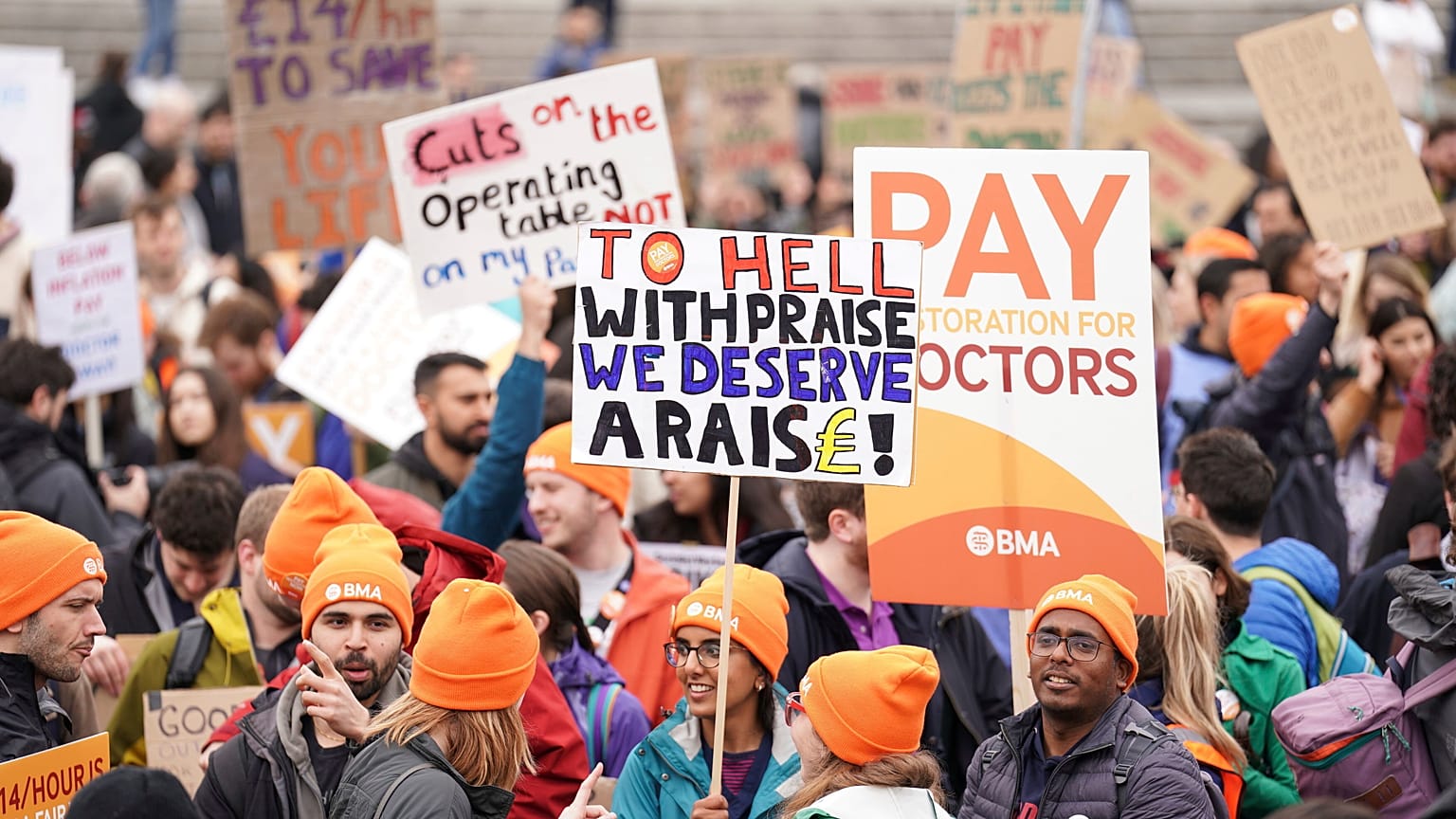 People take part in a rally in Trafalgar Square in support of striking NHS junior doctors, as the British Medical Association holds a 96-hour walkout in a dispute over pay. 
