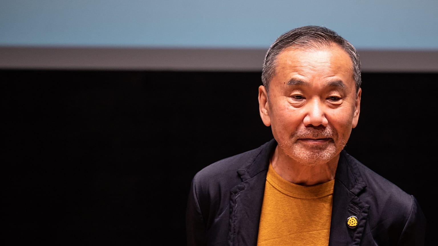 Haruki Murakami attends a press conference during a media preview of The Waseda International House of Literature