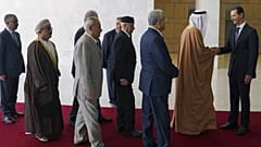 صورة للأسد خلال استقباله وفداً عربياً في دمشق في فبراير - شباط الماضي