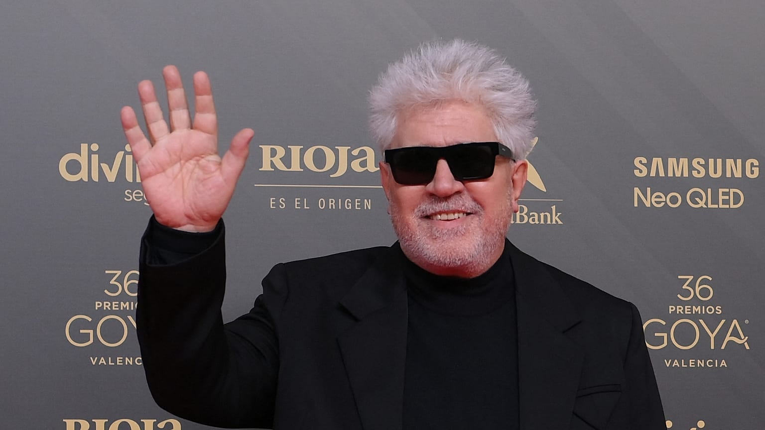 Spanish film director Pedro Almodovar poses on the red carpet upon arrival at the 36th Goya awards ceremony at the Palau de les Arts in Valencia, on February 12, 2022.