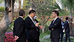 Emmanuel Macron con el presidente Xi Jinping durante la visita del dirigente francés a China